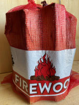 Firewood bundles in mesh bag